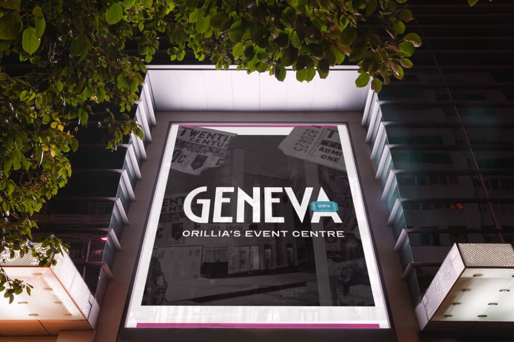 A lit square billboard at night, framed by leaves, showing GENEVA, Orillia’s Event Centre, over a faded ticket photograph.