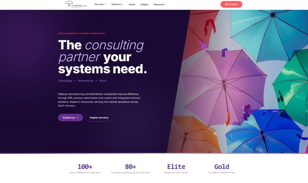 Umbrella Consulting homepage: a dark purple hero with a photograph of colourful umbrellas and a row of statistics along the bottom.
