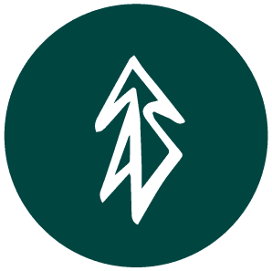 Walking in Trees circle mark: a white tree symbol centred on a dark teal circle.